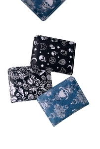 Detail of gothic skulls and mystical patterns on black and navy faux leather zip wallets