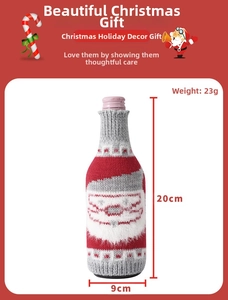 Detail showing knitted Christmas Santa wine bottle cover dimensions 20x9cm with weight 23g