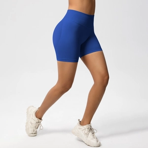 Detail view of seamless high-waisted blue yoga shorts with scrunch butt lifting effect