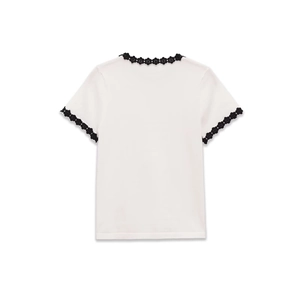 Detailed back view of white cotton T-shirt featuring decorative black 3D flower lace trim