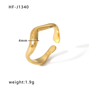 Detail of 4mm gold irregular wavy open ring with organic lines weighing 1.9g