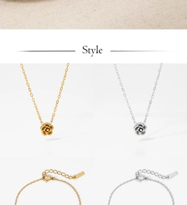 Detail of gold and silver rose pendant necklaces showing s.steel clasp engraving