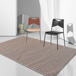 Detailed texture of brown faux linen woven rug in a minimalist modern living room setting