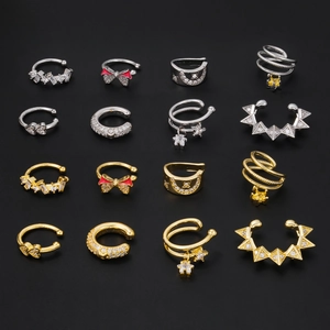 Set di 16 ear cuff color oro e argento con ciondoli a stella, cuore e cristalli