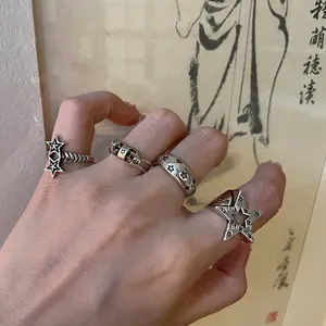 Anelli vintage in argento con stelle traforate e design retrò regolabile