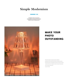 Detail of crystal LED table lamp showing warm ambient diamond-shaped light patterns