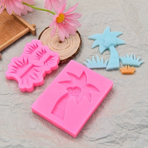Pink silicone fondant mold set featuring coconut tree and grass shapes for DIY cake baking