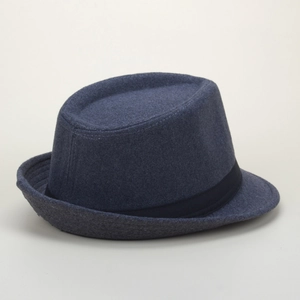 Close-up of dark blue wool fedora hat featuring textured felt and black grosgrain ribbon