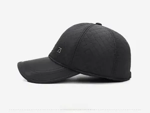 Side view of black quilted baseball cap for men featuring a silver square metal logo