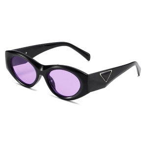 Trendy oval cat eye sunglasses with glossy black frames and purple lenses for women