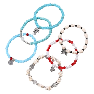 Conjunto de cinco tobilleras de cuentas con dijes de tortuga marina, estrella y palmera