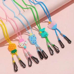 Detail of colorful beaded mask lanyards with various cute silicone cartoon charms