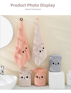 Detail of coral fleece cat hand towel with 3D ears and soft embroidered whiskers