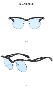 Front and side view of avant-garde sunglasses with wavy black frame and blue lenses