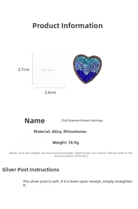 Detail shot of heart earrings with blue gradient rhinestones showing 2.7cm size scale