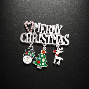 Broche de Noël avec bonhomme de neige et renne et inscription Merry Christmas argentée