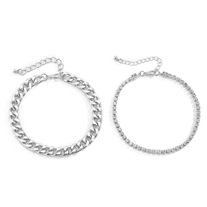 Silver Cuban link and rhinestone tennis anklet set with lobster clasp on white background