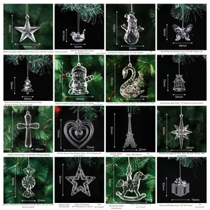 Macro detail of 16 assorted clear acrylic Christmas ornaments with hanging strings