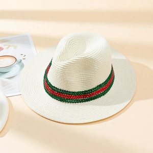 Chic cream straw fedora hat featuring a classic green and red rhinestone stripe band
