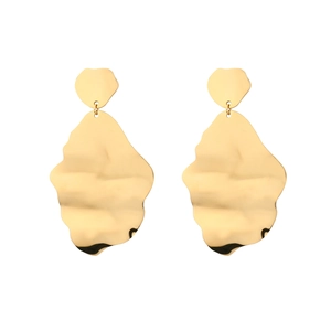 Elegant gold wavy metal tassel earrings with high-polish finish and artistic modern design