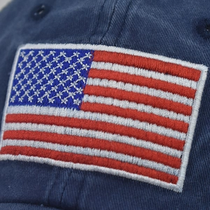 Navy washed cotton baseball cap with embroidered American flag star patch detail
