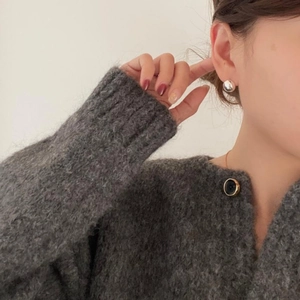 S925 sterling silver minimalist sphere stud earrings worn by a model in a lifestyle setting
