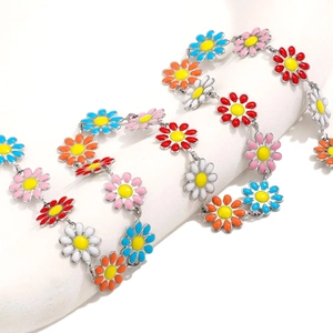 Colorful enamel daisy chain necklace made of durable stainless steel on white background