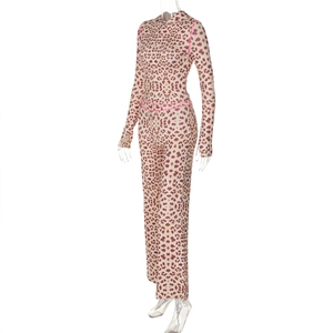 Detail of leopard print tracksuit featuring hooded cardigan and high-waisted tight pants