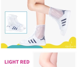 Detail of waterproof PVC rain shoe cover with zipper closure and non-slip sole feature
