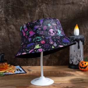 Close-up of Halloween bucket hat featuring skulls, bats, and magic potion prints