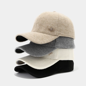 Knitted winter baseball caps in four colors featuring a stylish star rhinestone detail