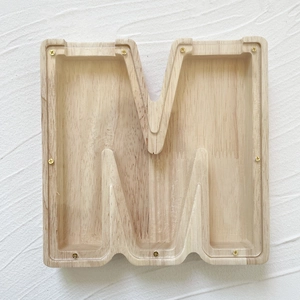 Detail view of M-shaped oak wood money box with transparent acrylic panel and metal screws