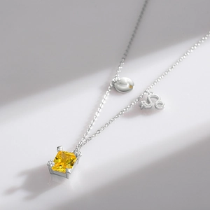 S925 sterling silver Leo necklace with square yellow gemstone pendant on white background