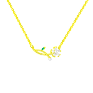 Elegant gold flower necklace with white pearls and a green marquise gemstone on white background