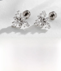 Silver snowflake earrings with micro-inlaid zircon and screw back detailing on silver metal