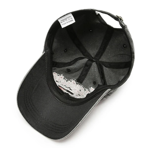 Washed cotton baseball cap interior view showing metal buckle and reinforced lining