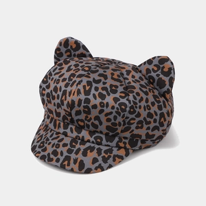 Detail shot of leopard print newsboy cap with cute cat ears in a grey and brown textured finish