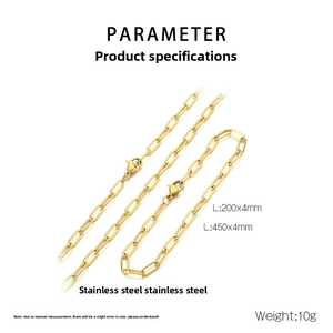 Polished gold stainless steel paperclip chain set including necklace and bracelet detail