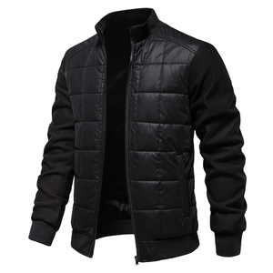 Detail of men's quilted stand-collar jacket with mixed honeycomb texture and zipper