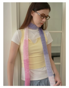 Detailed view of long Y2K style faux mink scarf with pink and purple gradient plush fabric