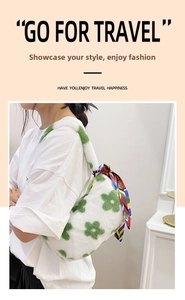 Detailed shot of white plush shoulder bag featuring green floral patterns and silk scarf