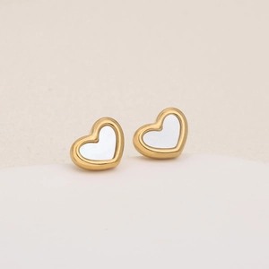 Elegant gold heart earrings with white mother-of-pearl inlay on a neutral background