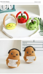 Detail of crochet positive potato and fruit dolls with motivational quote cards