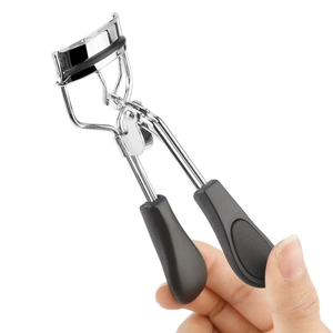 Portable stainless steel mini eyelash curler with black non-slip ergonomic handle