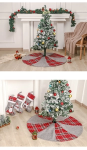 Close-up of red and grey plaid Christmas tree skirt with festive fabric texture