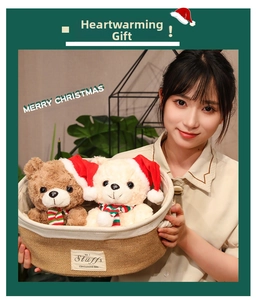 Detail of Christmas teddy bears in a woven basket with festive hats and scarves
