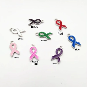 Detailed view of colorful alloy ribbon bow charms with enamel finish for DIY jewelry