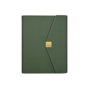 Close-up of green leather notebook cover with litchi texture and gold metal buckle