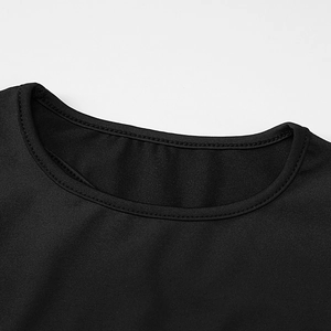 Detailed close-up of the round neckline with double-needle stitching on a black mini dress