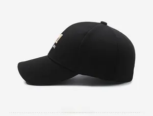 Close-up of side embroidery detail on breathable black cotton baseball cap